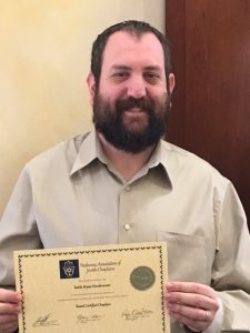 Rabbi with certificate