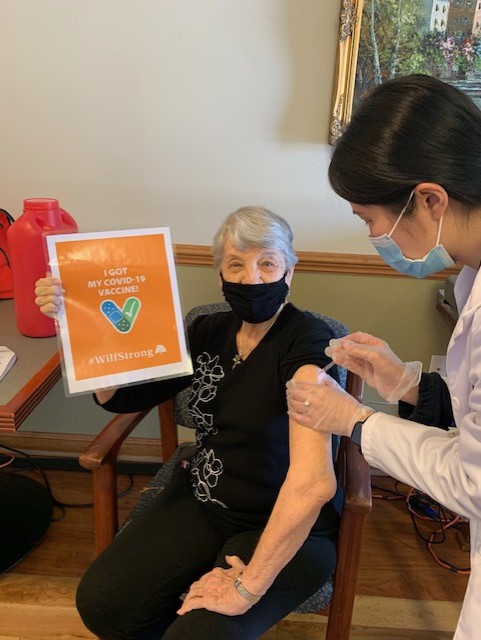 woman receiving vaccine